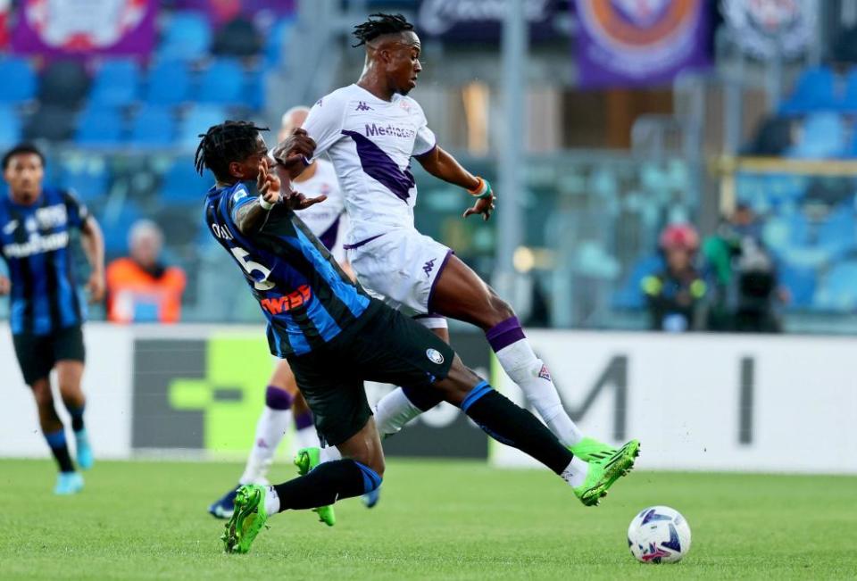 Caleb Okoli slides in to tackle Fiorentina’s Christian Kouamé.