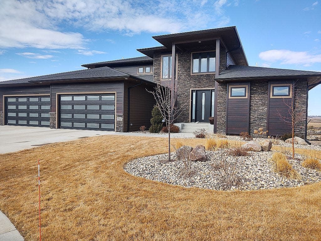 The six-bedroom, four-bathroom home at 9513 W. Lakeside Circle offers 4,500 square feet on an acre of land by Cherry Lake.