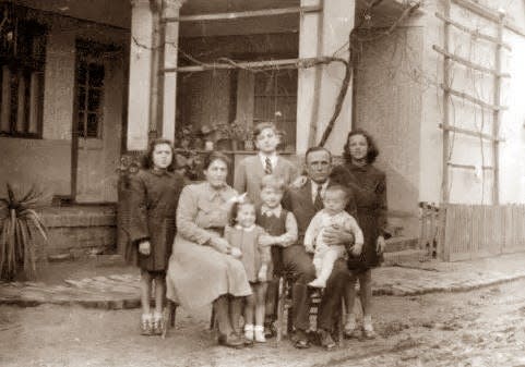 This is the John Webel family in Vinkovci, Croatia, in a photo taken around 1951. Peter Webel is to the left of his father, John, and Frieda is the girl to the far left.