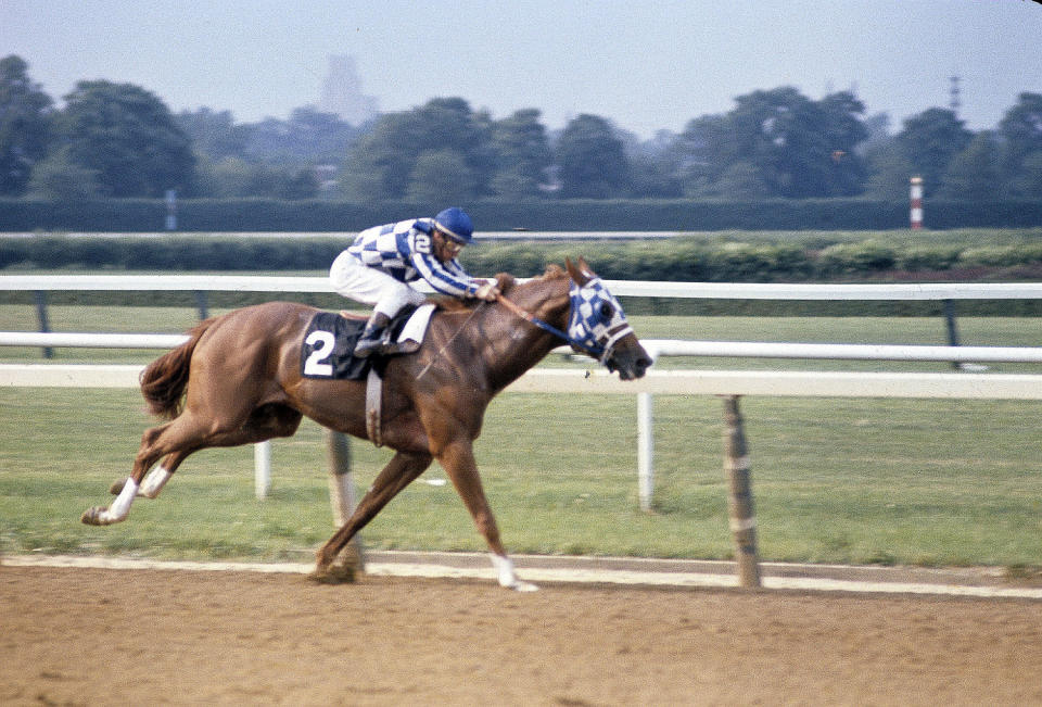 Jockey Ron Turcotte sits atop of Secretariat. (Focus On Sport / Getty Images)