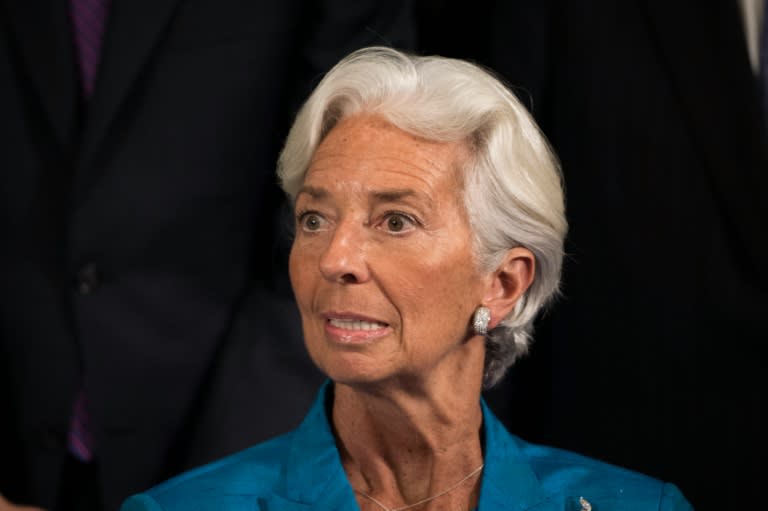 IMF managing director Christine Lagarde says the world faces a "low-growth trap" of high debt and weak demand