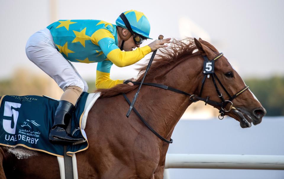 Derma Sotogake with jockey Christophe Lemaire wins Group 2 UAE Derby over 1900m (9.5 furlongs) at the Meydan racecourse in Dubai, United Arab Emirates, Saturday, March 25, 2023. (AP Photo/Martin Dokoupil)