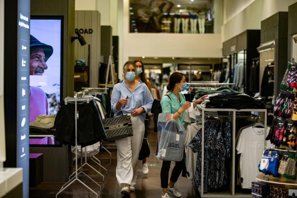 Shoppers wear a face mask at David Jones store in Melbourne, Australia. 