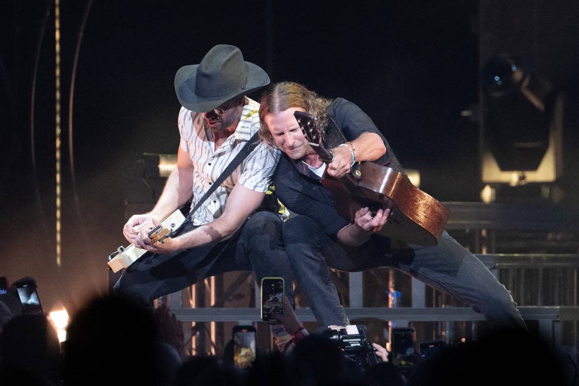 Dierks Bentley performs the song ‘Lot of Leavin’ Left to Do’ during his concert at T-Mobile Center on Friday in Kansas City.