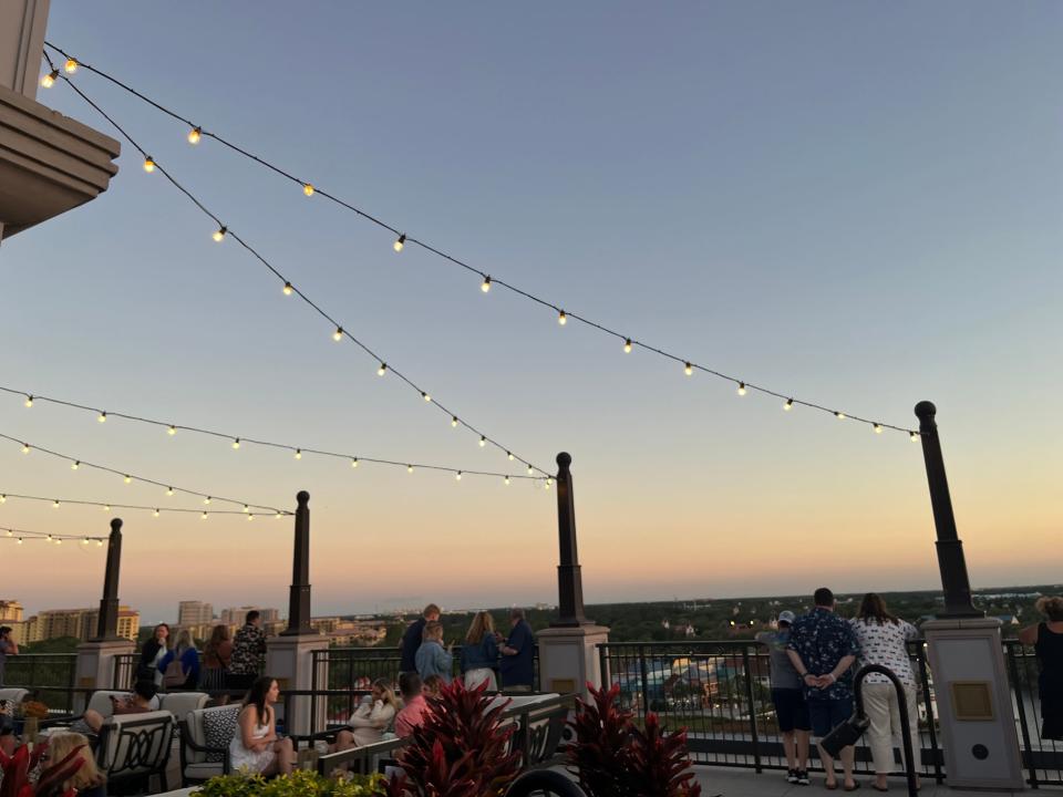 outdoor terrace at topolino's terrace at disney's riviera resort