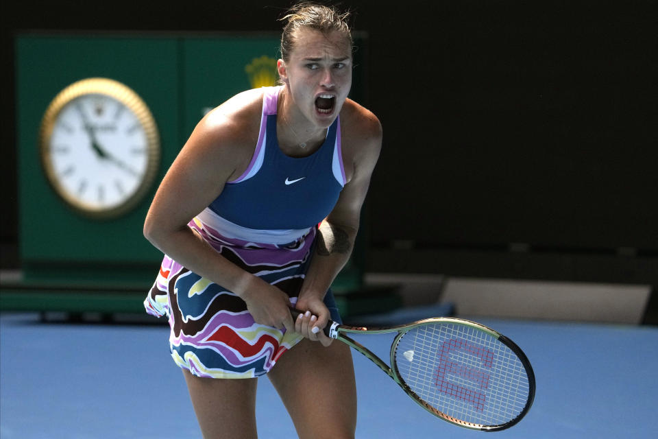 Aryna Sabalenka of Belarus reacts during her third round match against Elise Mertens of Belgium at the Australian Open tennis championship in Melbourne, Australia, Saturday, Jan. 21, 2023. (AP Photo/Ng Han Guan)