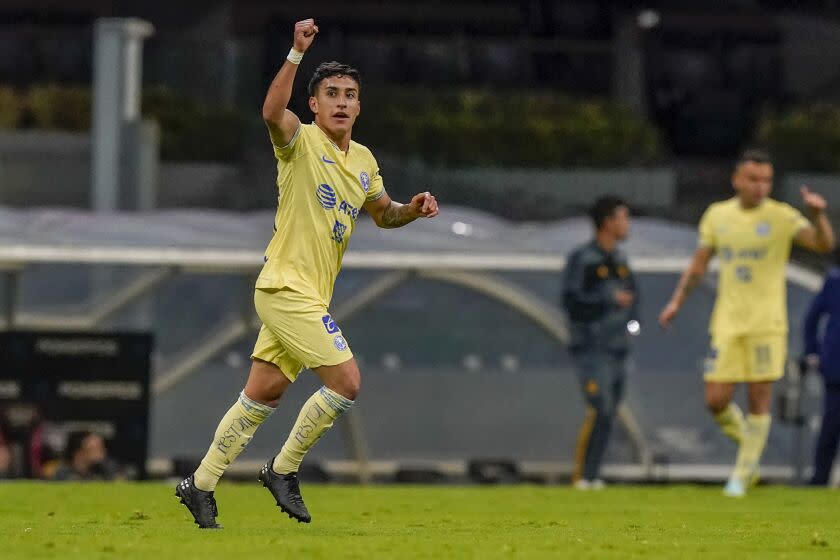 America's Alejandro Zendejas celebrates scoring his side's 2nd goal against Tigres during a Mexican soccer league match at Azteca stadium in Mexico City, Saturday, Sept. 3, 2022. (AP Photo/Eduardo Verdugo)