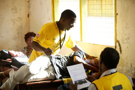 International Rescue Committee (IRC) psychologist Alex Kalatu lectures in front of health workers at the Kakuma refugee camp in northern Kenya, March 6, 2018. REUTERS/Baz Ratner