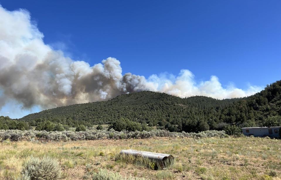 The American Mesa Fire burning southwest of Dulce had burned 756 acres as of Tuesday and was 25% contained.