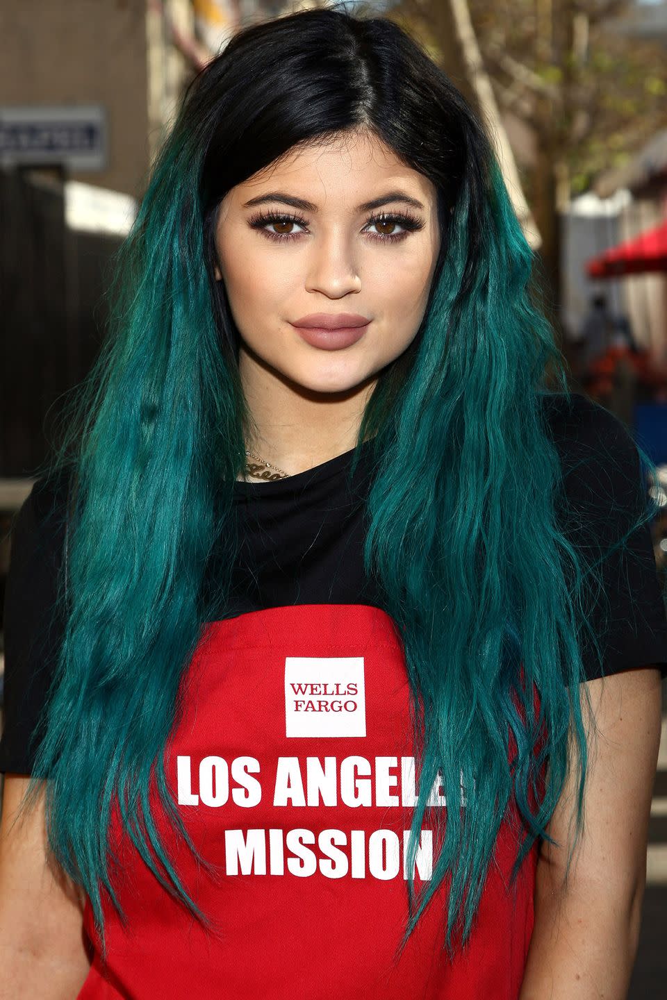 <p>Ultra-long lashes and teal hair extensions in 2014.</p>