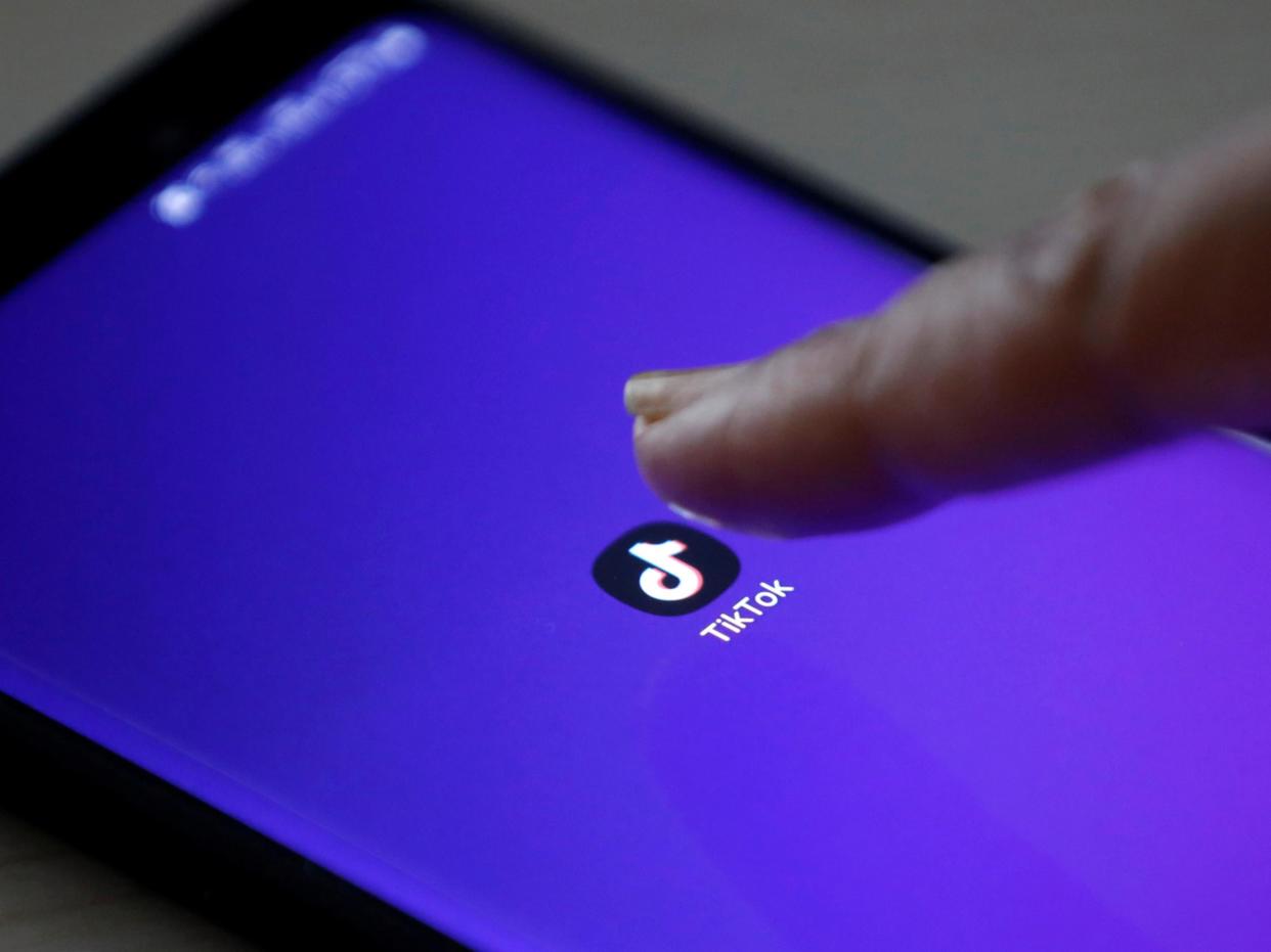 A security weakness in the popular video-sharing app TikTok appears to let hackers hijack a user's feed (Reuters)