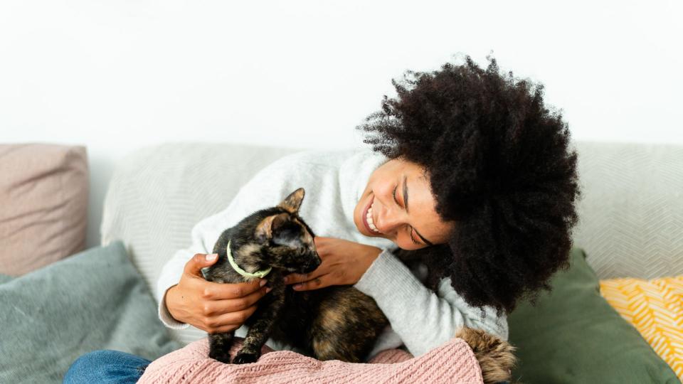 Woman holding cat