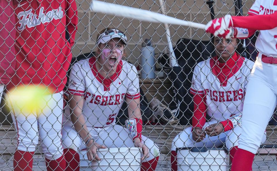 Fishers Tigers Brooke Johnson (5) yells from the dugout during the game against the Hamilton Southeastern Royals on Tuesday, April 25, 2023 at Fishers High School in Fishers. The Fishers Tigers defeated the Hamilton Southeastern Royals, 1-0. 