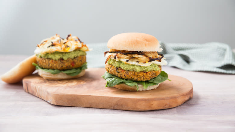 avocado veggie burgers on table