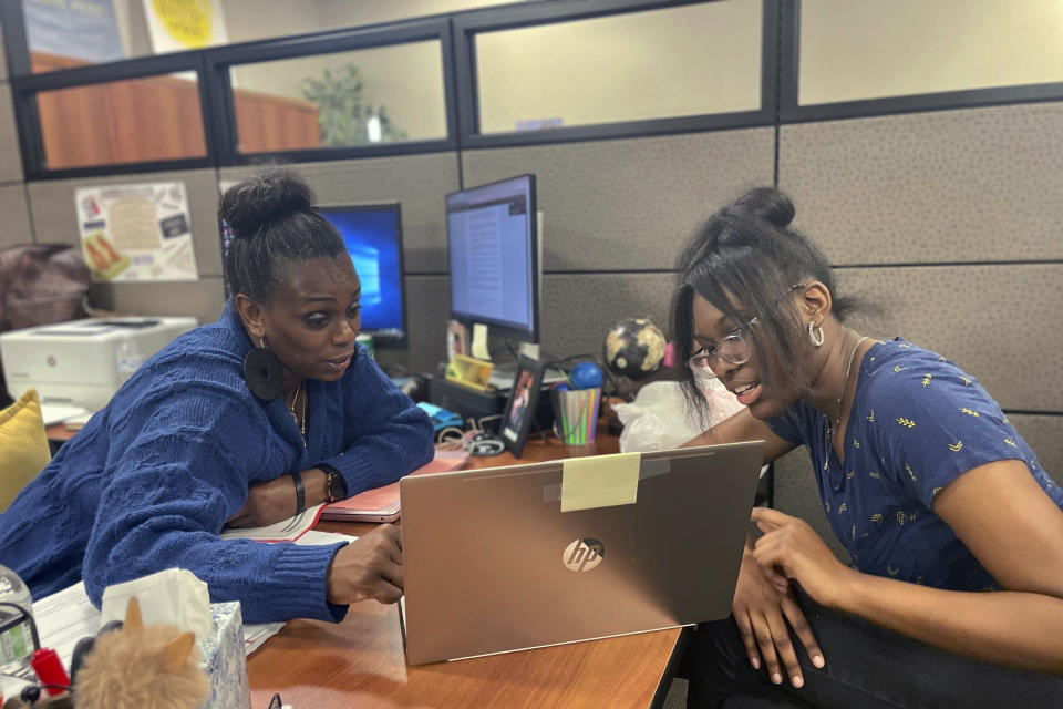 Success Coach Latasha Wiley, left, helps first-year student Amare Porter, right, with her class schedule at Chattahoochee Valley Community College's advising center on Feb. 23, 2023, in Phenix City, Ala. At the school, the Strategies to Enhance New Student Engagement program, or SENSE, has counselors reach out to students. (Rebecca Griesbach/Press-Register via AP)