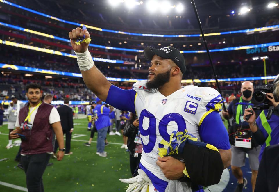  Los Angeles Rams defensive end Aaron Donald celebrates after defeating the Cincinnati Bengals in Super Bowl LVI at SoFi Stadium. 