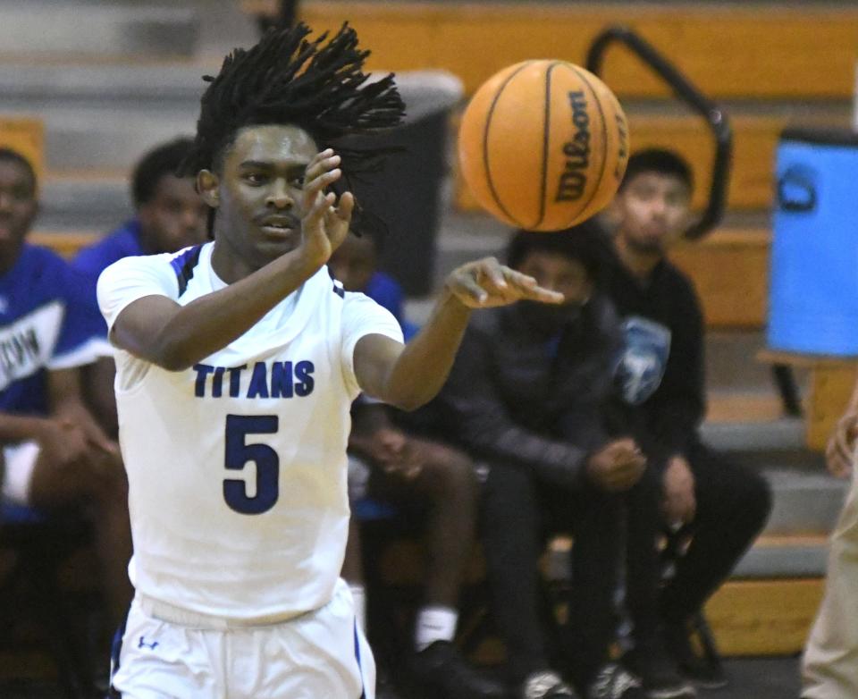 Trask's Robert Pridgen scored a game-high 12 points Friday night as the Titans opened play in the Lake Waccamaw Conference with an 81-23 win over Union. Matt Born/StarNews