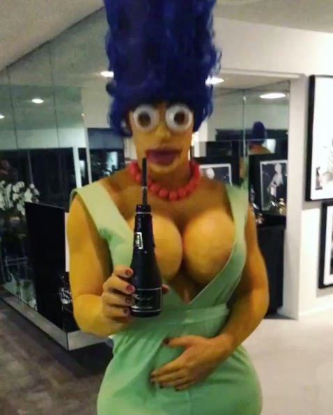 <p>The former <em>Teen Wolf</em> actor could’ve taken the easy way out and dressed as a werewolf when he hosted a Halloween party in Hollywood. Instead, he spent five hours transforming into sexy Marge Simpson. Whaddya think of the results? (Photo: Instagram/Colton Haynes) </p>