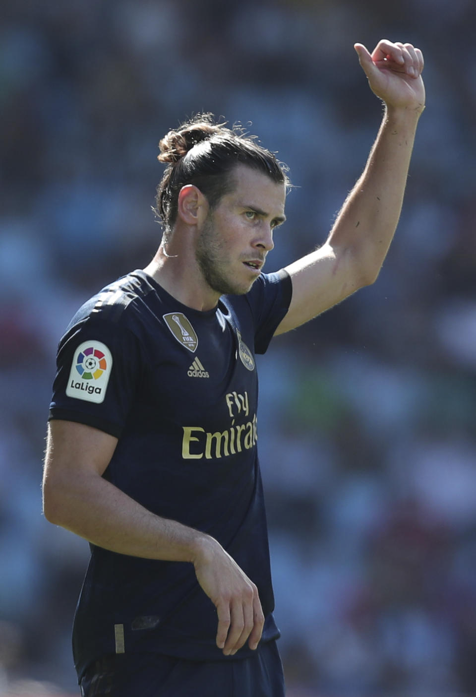 Real Madrid's Gareth Bale gestures during La Liga soccer match between Celta and Real Madrid at the Balaídos Stadium in Vigo, Spain, Saturday, Aug. 17, 2019. (AP Photo/Luis Vieira)