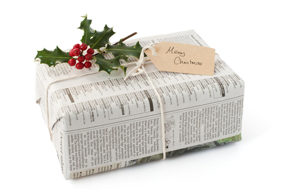 Christmas present gift wrapped in newspaper  