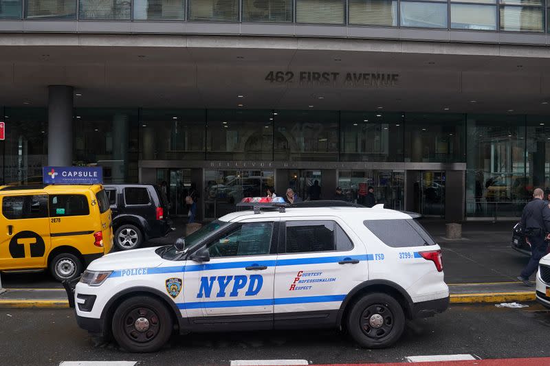 A police car is parked outside Bellevue Hospital a day after Harvey Weinstein was found guilty of rape in the Manhattan borough of New York City