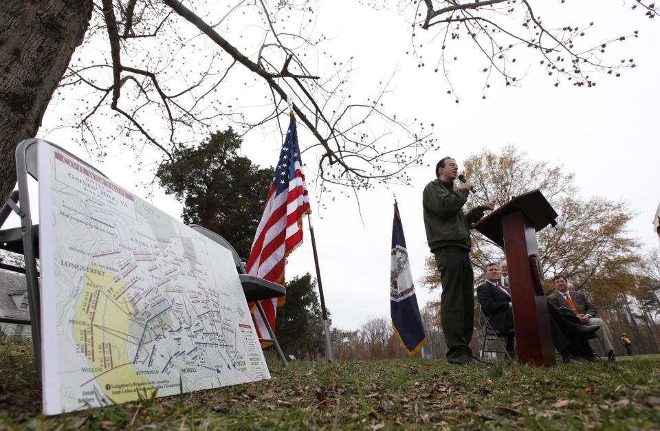 Bobby Krick, historian for the Richmond National Battlefiled, speaks during a news conference announcing the purchase of 285 acres of land at the Gaines Mill Civil War battlefield siteMonday, Nov. 19, 2012 in Mechanicsville, VA. The map to the left details some of the acreage purchased. Gaines' Mill is where Gen. Robert E. Lee had his first major victory as commander of the Army of Northern Virginia. (AP Photo/Steve Helber)