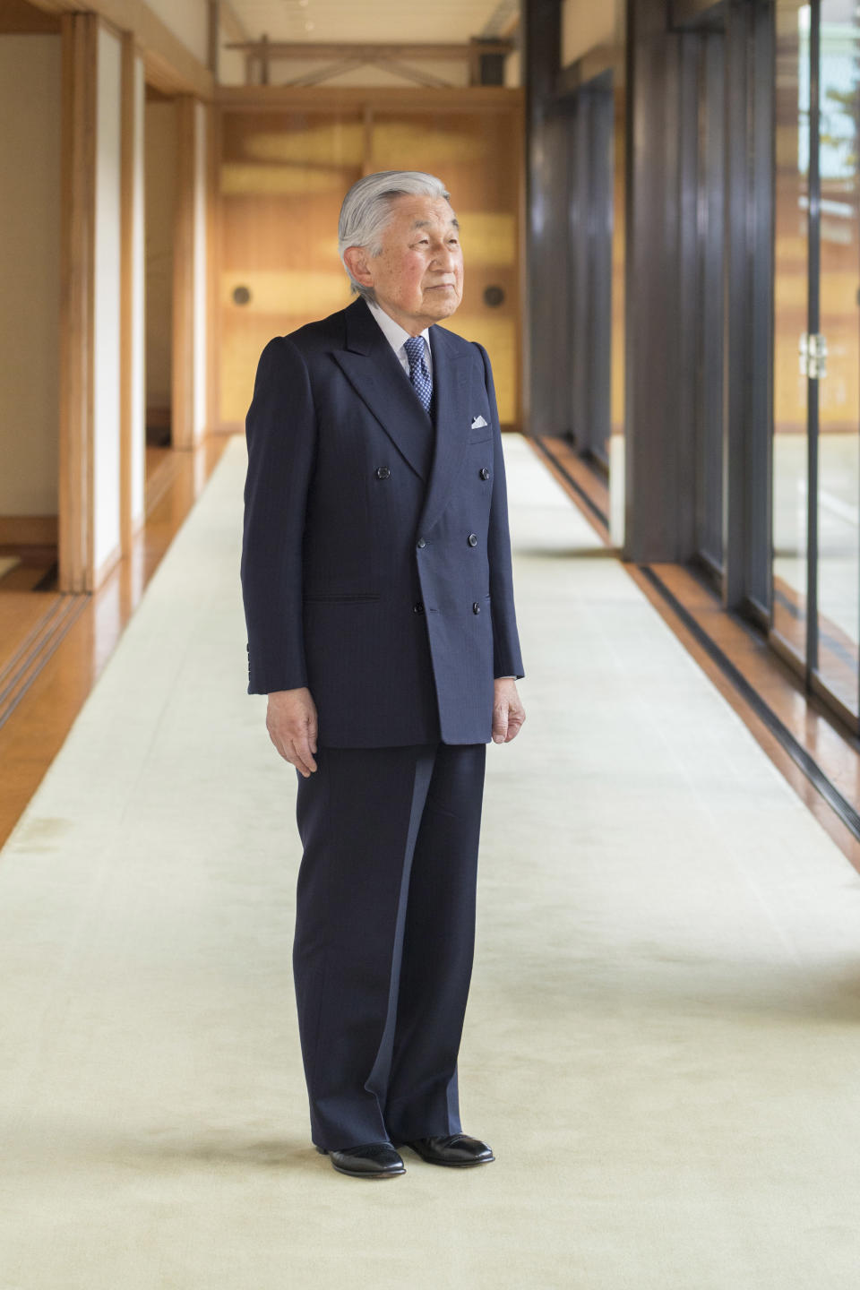 In this Monday, Dec. 10, 2018, photo released on Friday, Dec. 21, 2018, by the Imperial Household Agency of Japan, Japan's Emperor Akihito poses for a photograph at the Imperial Palace in Tokyo. Emperor Akihito, who turns 85 on Sunday, Dec. 23, 2018, and will abdicate this spring, says he feels relieved to see the era of his reign coming to an end without having seen his country at war. (The Imperial Household Agency of Japan via AP)