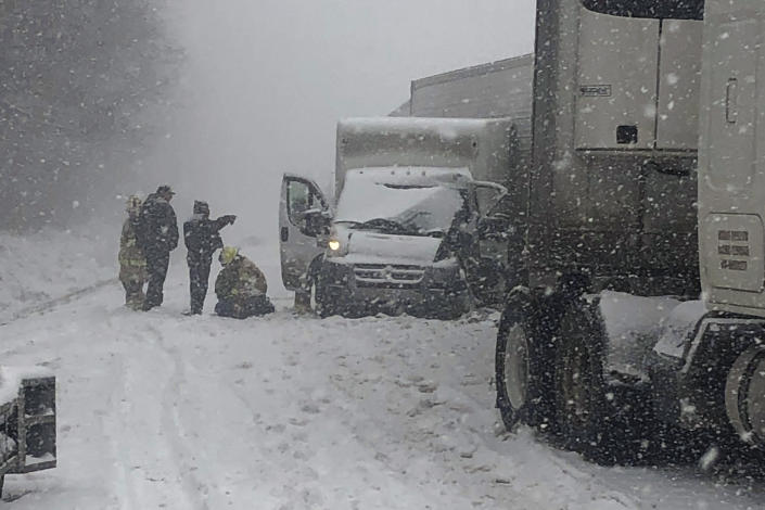 A truck is stuck on a snow-covered road after a multi-vehicle crash on Interstate 81 in Roanoke County, Virginia, on Sunday, Jan. 16, 2022. (Virginia State Police/AP)