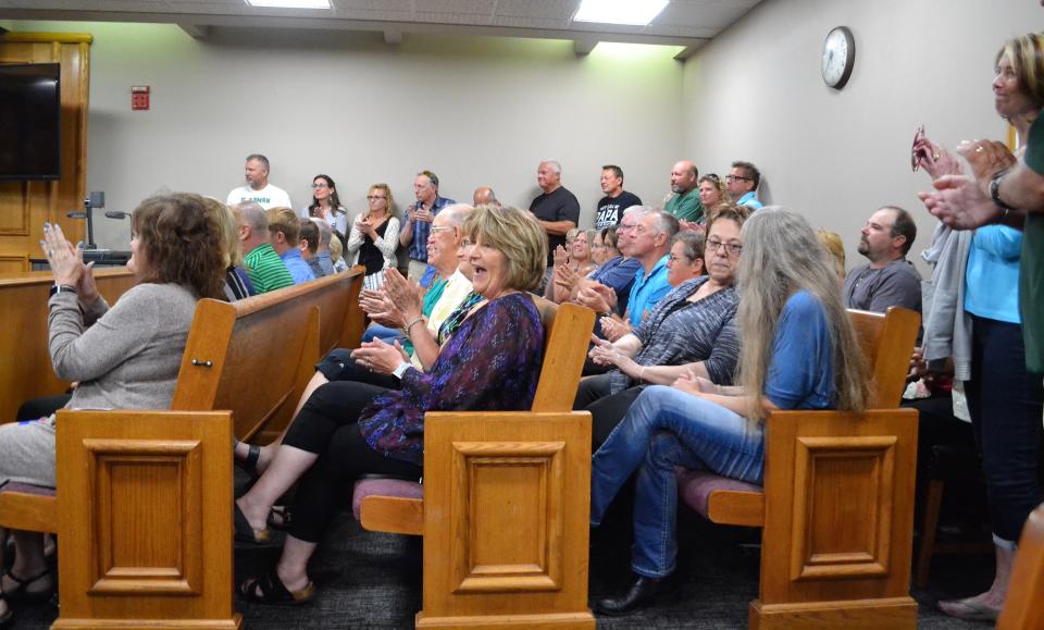 Supporters of Suring superintendent Kelly Casper applauded after a judge on Tuesday dismissed the false imprisonment charges filed over the alleged confinement of students on Jan. 17 so they could be searched for vaping products.