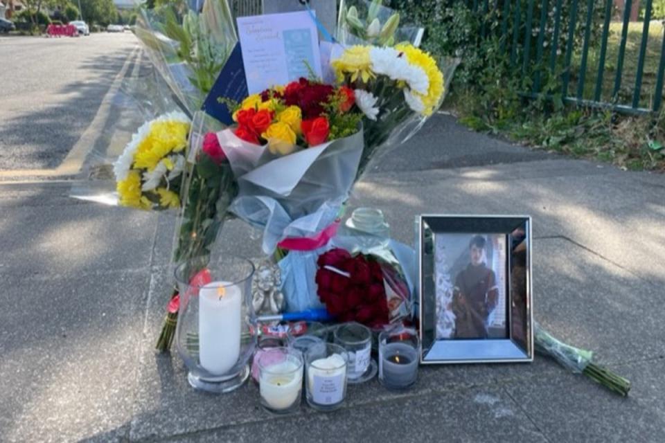 Tributes left near the scene at Langworthy Road in Salford (PA)