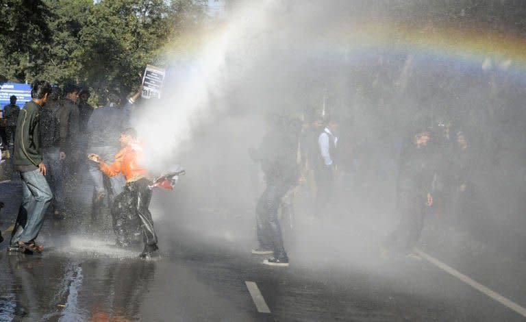 Indian police use a water canon to disperse protesters during a demonstration against the gang-rape of a student in New Delhi on December 19, 2012