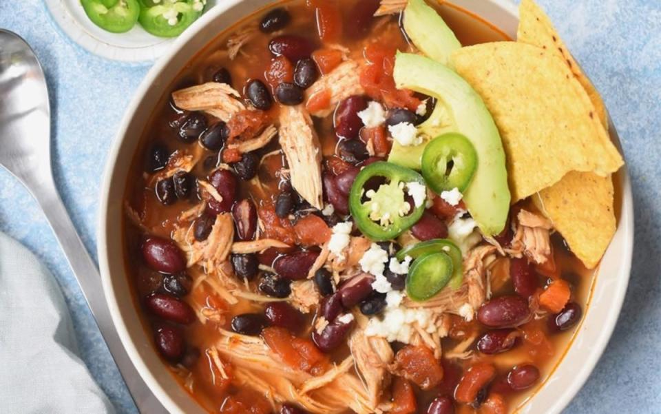 <p>Theresa Blackburn</p><p>Everyone knows that this hearty soup has some of the best ingredients ever! Top with fresh avocados and jalapenos. </p><p><strong>Get the Recipe: <a href="/1154137/parade/slow-cooker-chicken-enchilada-soup/" data-ylk="slk:Best Crock Pot Chicken Enchilada Soup Recipe;elm:context_link;itc:0;sec:content-canvas" class="link ">Best Crock Pot Chicken Enchilada Soup Recipe</a></strong></p>