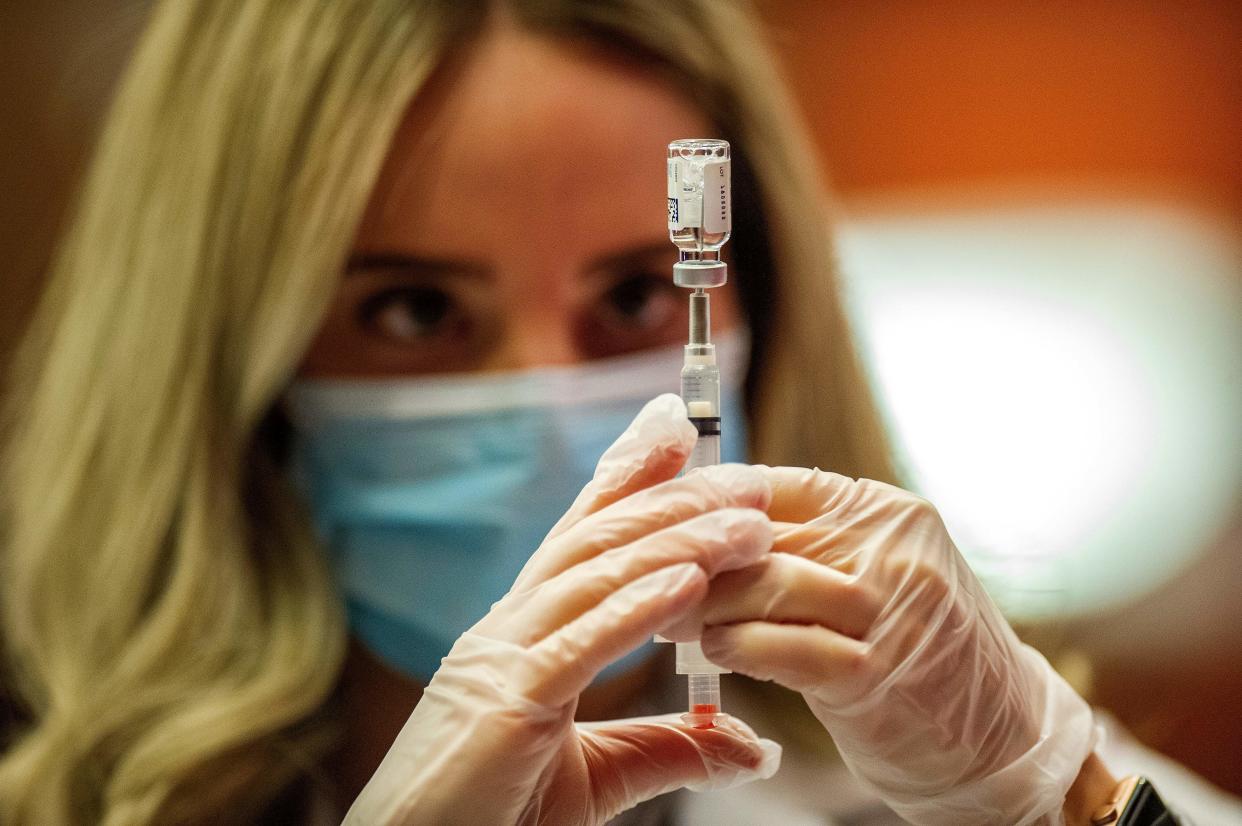 Pharmacist Madeline Acquilano fills a syringe with the Johnson &amp; Johnson COVID-19 Vaccine before inoculating members of the public at Hartford Hospital in Hartford, Connecticut, on March 3, 2021. (Photo: JOSEPH PREZIOSO/AFP via Getty Images)