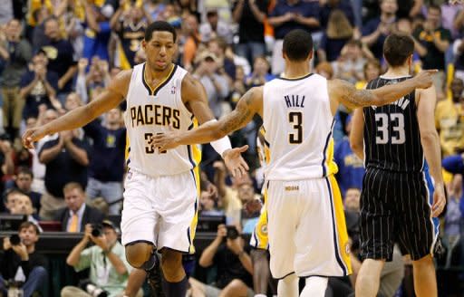 Indiana Pacers' Danny Granger (L) and teammate George Hill (C) during game five of the NBA Eastern Conference series on May 8. The Pacers punched their ticket to the second round of the NBA playoffs by beating Orlando Magic 105-87