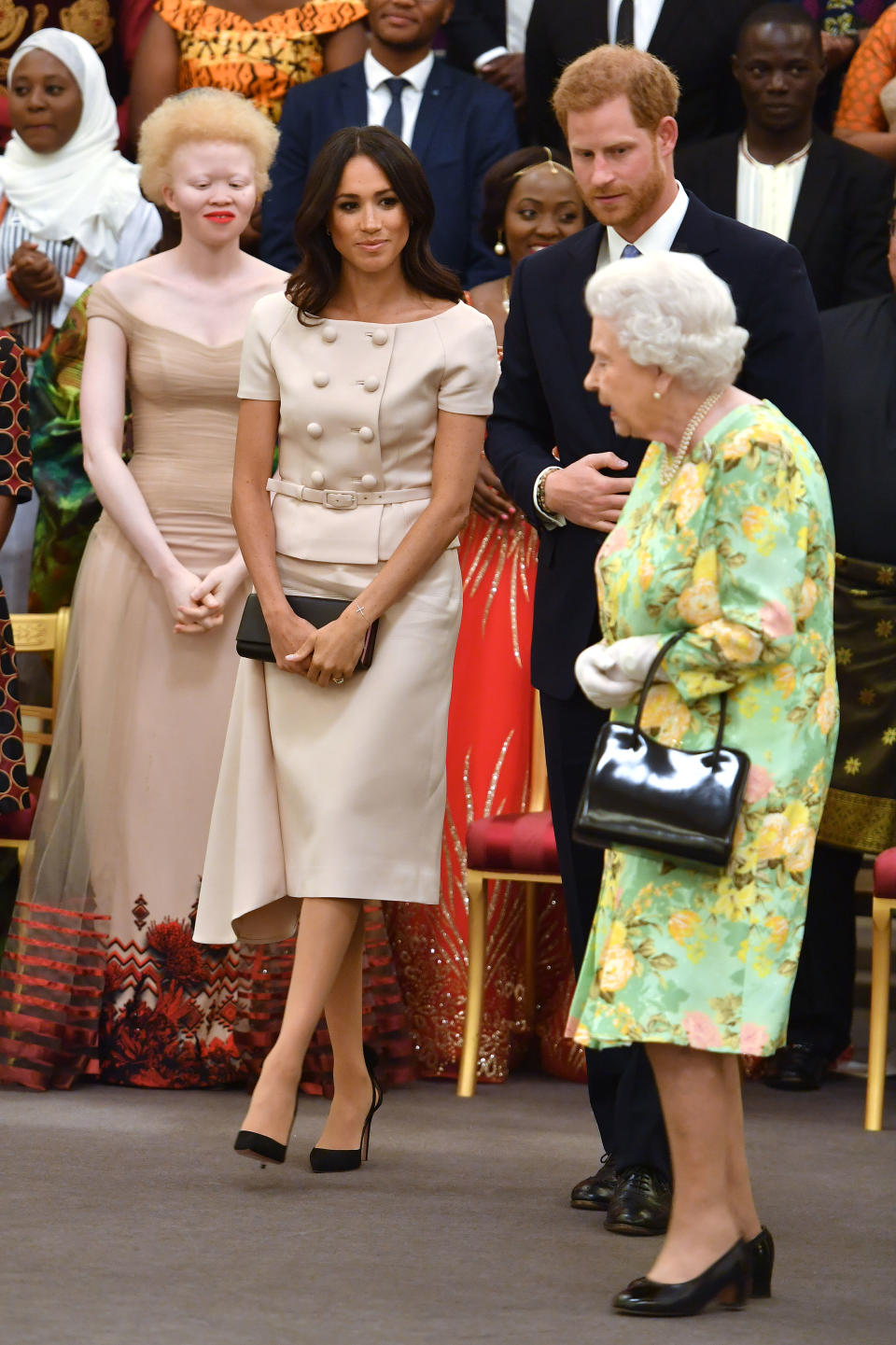 Markle wore Prada for her recent engagement with the Queen and Prince Harry.