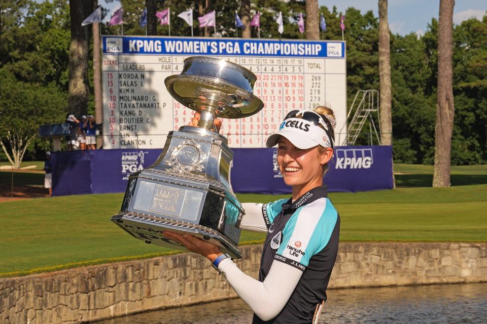 2021 KPMG Women's PGA Champion Nelly Korda poses with the KPMG trophy after the final round for the 2021 KPMG Women's Championship at the Atlanta Athletic Club on June 27, 2021 in Johns Creek, Georgia.