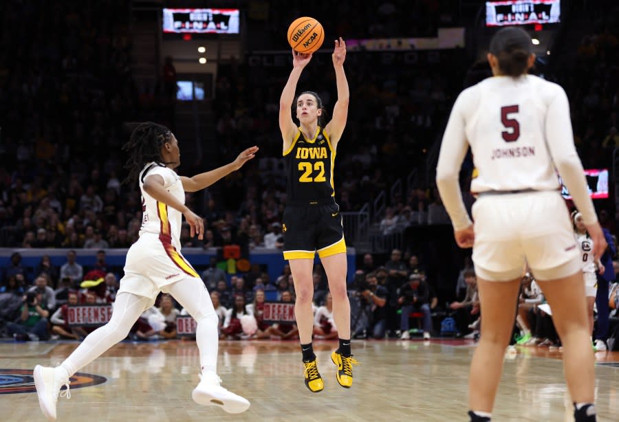 CLEVELAND, OHIO – APRIL 07: Caitlin Clark #22 of the Iowa Hawkeyes shoots over Ashlyn Watkins #2 of the South Carolina Gamecocks in the second half during the 2024 NCAA Women’s Basketball Tournament National Championship at Rocket Mortgage FieldHouse on April 07, 2024 in Cleveland, Ohio. (Photo by Steph Chambers/Getty Images)