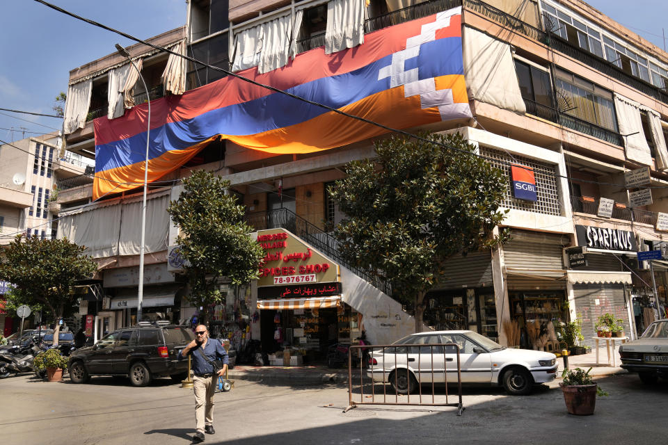A giant flag of Nagorno-Karabakh region hanged on a building, in the main Armenian district of the northern Beirut suburb of Bourj Hammoud, Lebanon, Monday, Sept. 25, 2023. The swift fall of the Armenian-majority enclave of Nagorno-Karabakh to Azerbaijani troops and exodus of much of its population has stunned the large Armenian diaspora around the world. (AP Photo/Hussein Malla)
