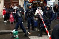 French police secure the area after a man was shot dead at a police station in the 18th district in Paris, France, January 7, 2016. REUTERS/Benoit Tessier