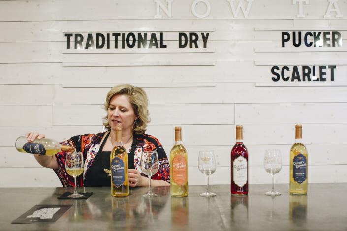 Jeri Carter pours honey wine at Queen's Reward Meadery