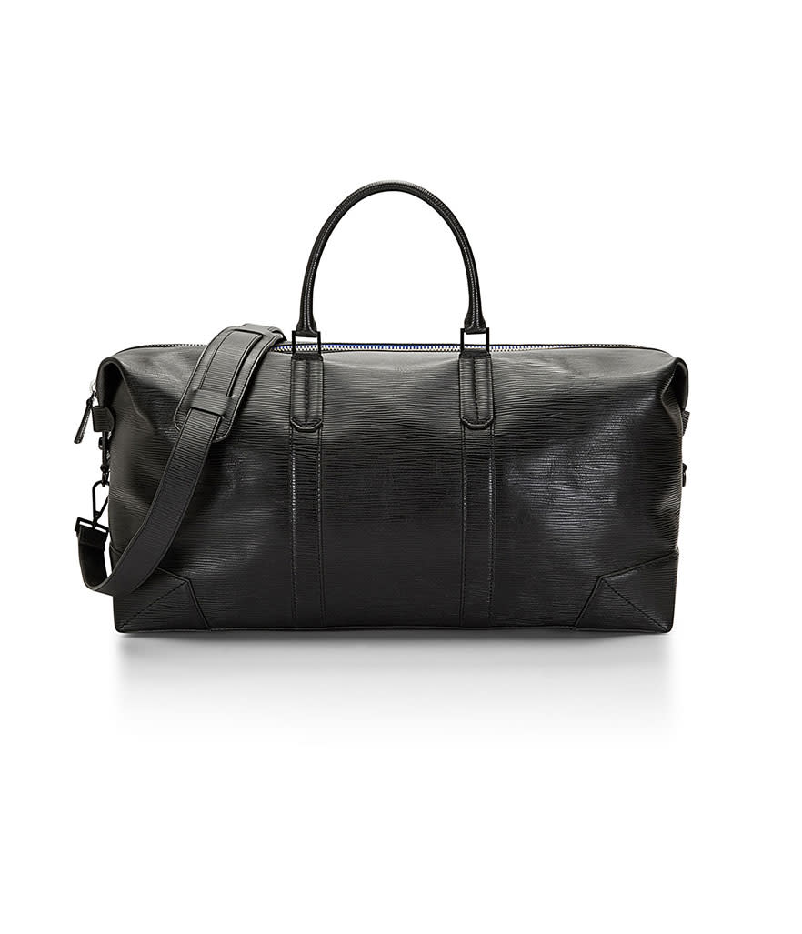 <p>Ben Minkoff Wythe Weekender in Black, $450, <a rel="nofollow noopener" href="http://www.rebeccaminkoff.com/wythe-weekender-black-epi" target="_blank" data-ylk="slk:rebeccaminkoff.com;elm:context_link;itc:0;sec:content-canvas" class="link ">rebeccaminkoff.com</a></p>