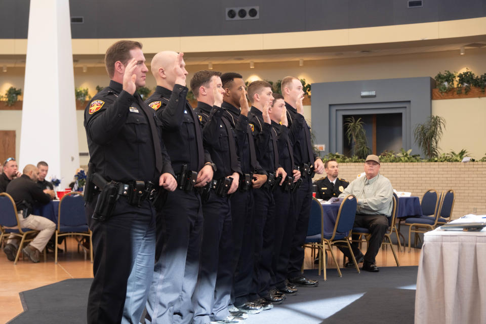 Graduates of the 101st Amarillo Police Academy take their oaths of office Thursday at the Amarillo Civic Center.