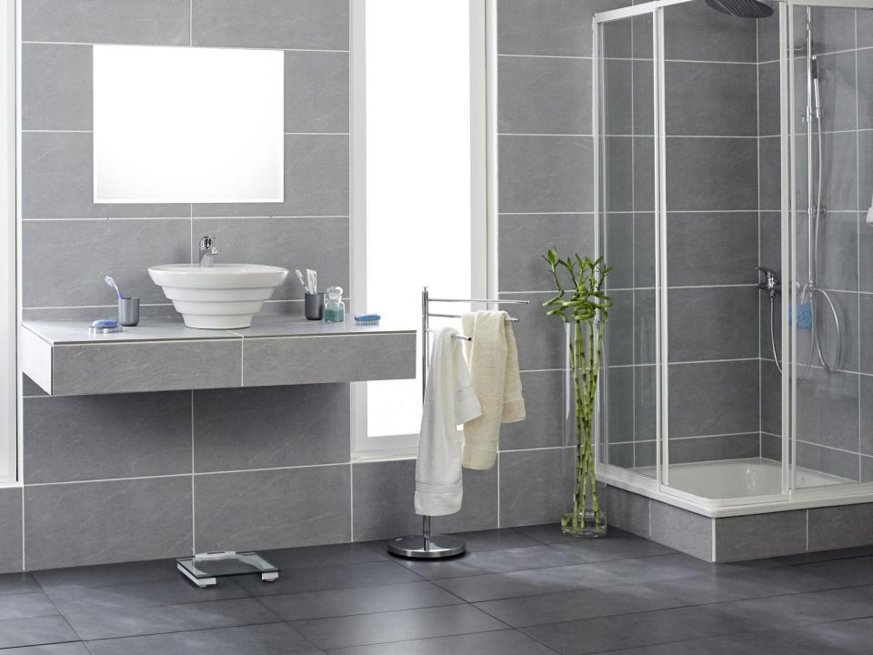 Bathroom with floor-to-ceiling gray tile