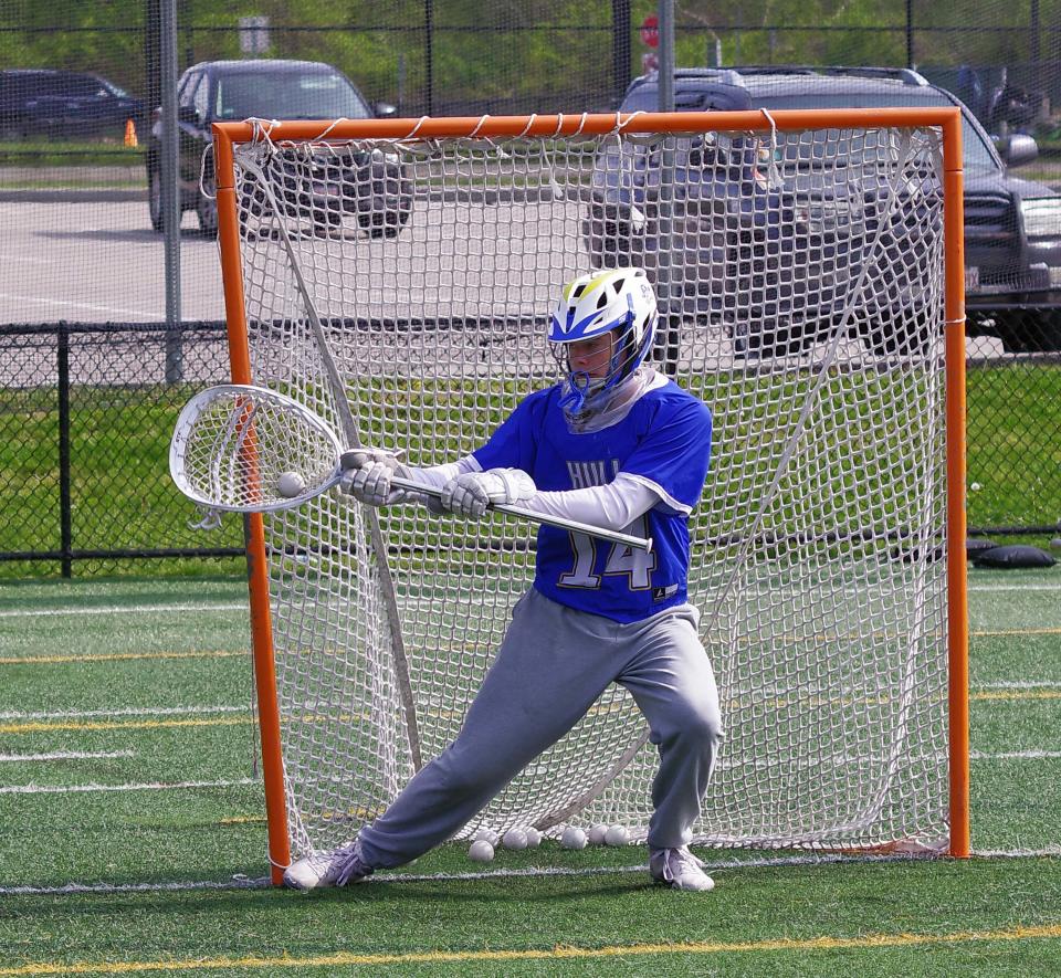 Hull goalie Sean Walsh takes some pre-game warm-ups during a recent match with Abington. May 9, 2023.