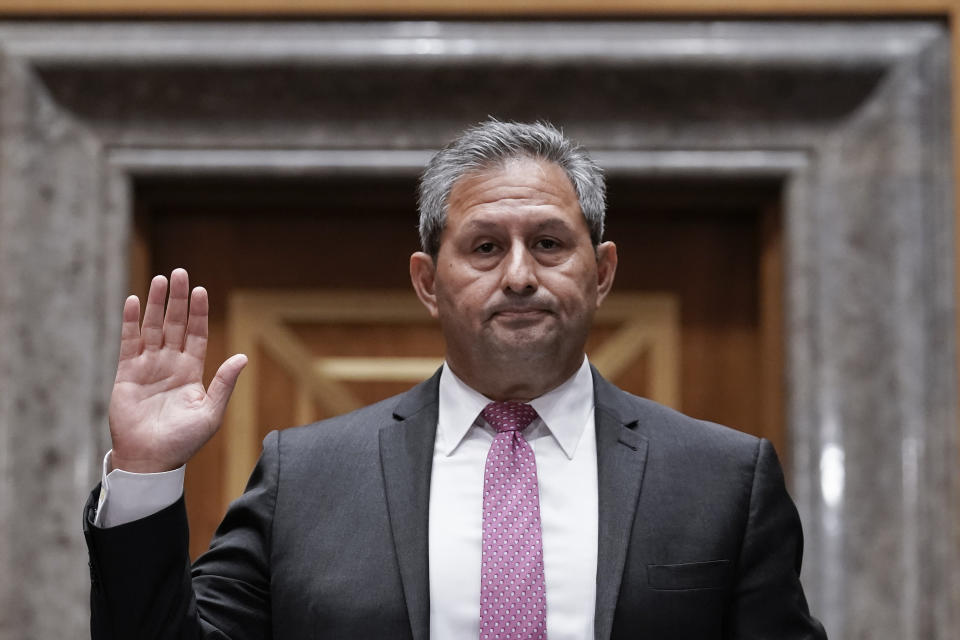 Michael Carvajal, director of the Federal Bureau of Prisons, is sworn in to testify as the Senate Permanent Subcommittee On Investigations holds a hearing on charges of corruption and misconduct at the U.S. Penitentiary in Atlanta, at the Capitol in Washington, Tuesday, July 26, 2022. (AP Photo/J. Scott Applewhite)