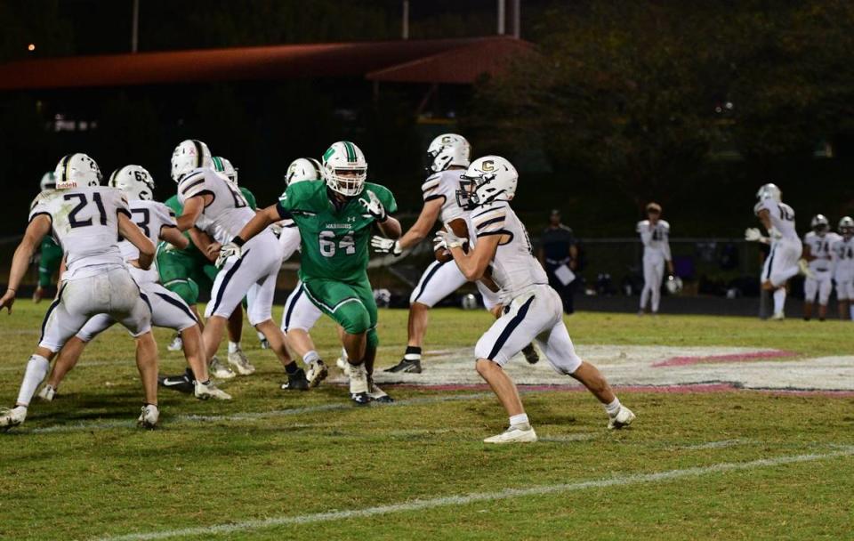 Josh Moraja, No. 64, played offensive lineman and defensive lineman for Weddington High before playing multiple characters in the “Seussical” musical. Courtesy Josh Moraja