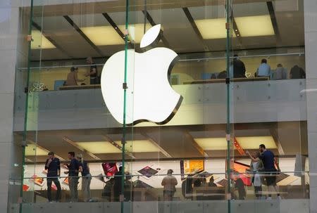 Customers and employees are shown through Apple's Australian flagship store in Sydney, September 7, 2016. REUTERS/Jason Reed