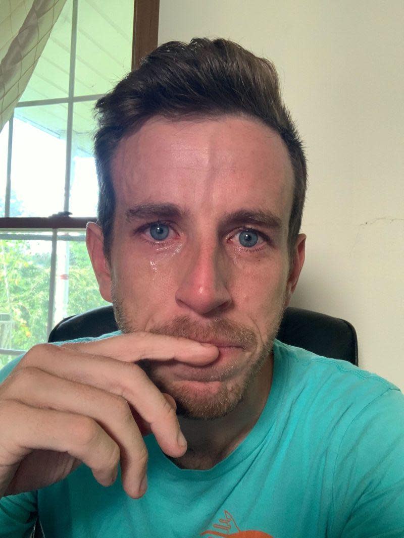 Braden Wallake, the CEO of HyperSocial, posted a selfie of him crying while announcing some layoffs at his company. He received criticism for the photo and some hailed him for his vulnerability.  / Credit: LinkedIn/Braden Wallake