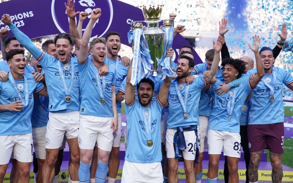 Manchester City's Ilkay Gundogan lifting the Premier League trophy - Premier League 2023/24: When are the fixtures for next season announced? - PA/Martin Rickett