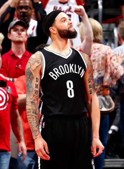 Deron Williams reacts after missing a basket in the final seconds of Game 2. (Kevin C. Cox/Getty Images)